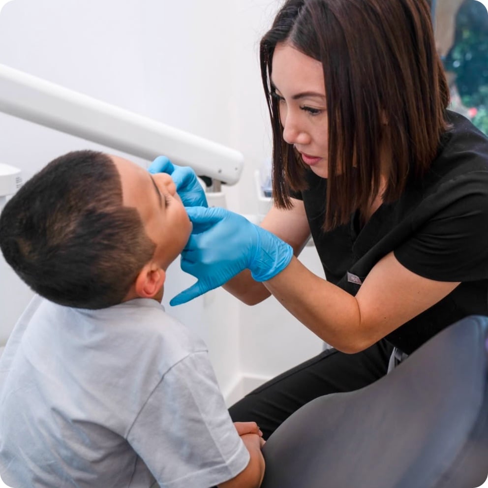 Doctor examining a young patient