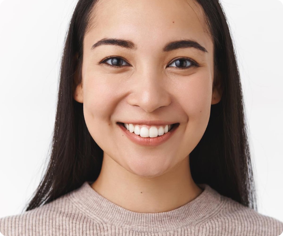 Smiling patient with a bright, natural-looking smile