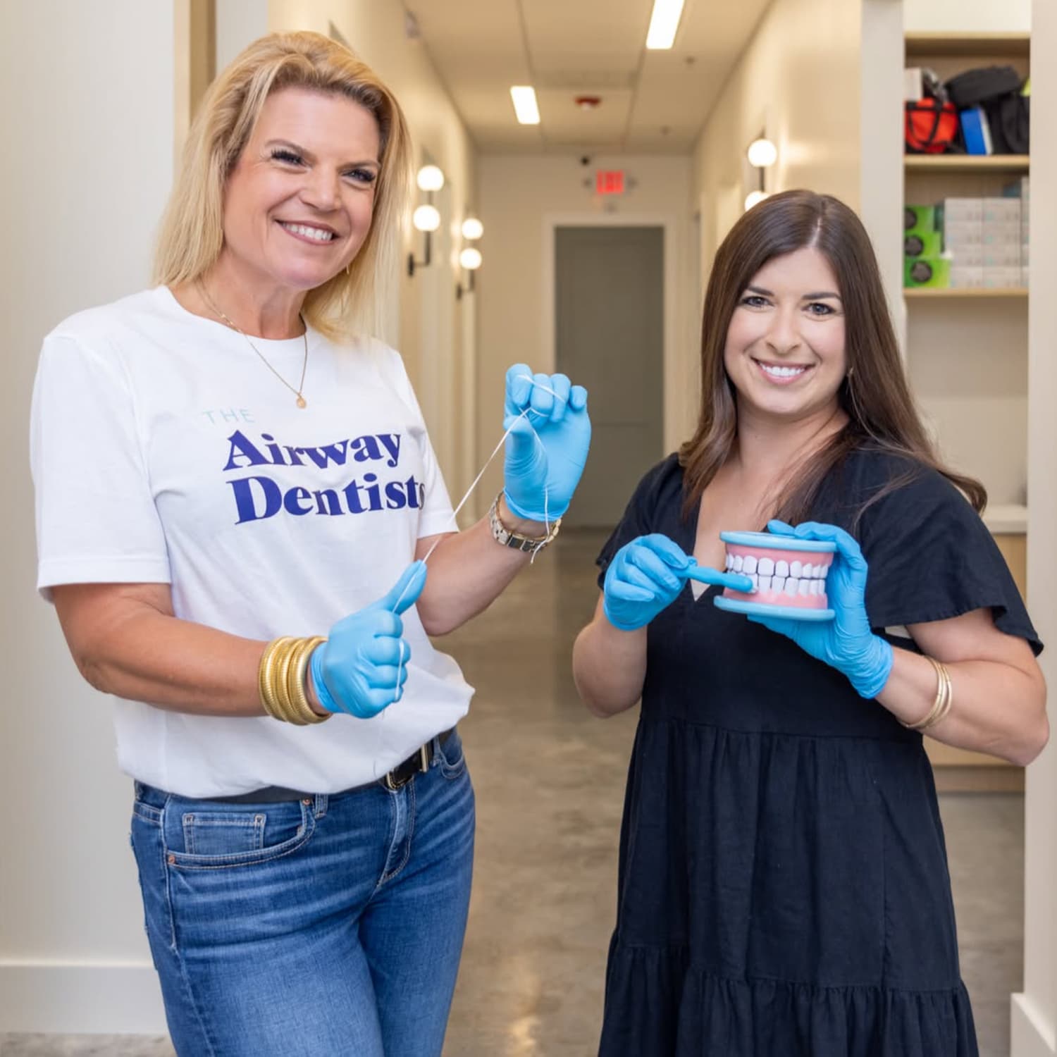 Friendly staff members at The Airway Dentists, smiling in the office