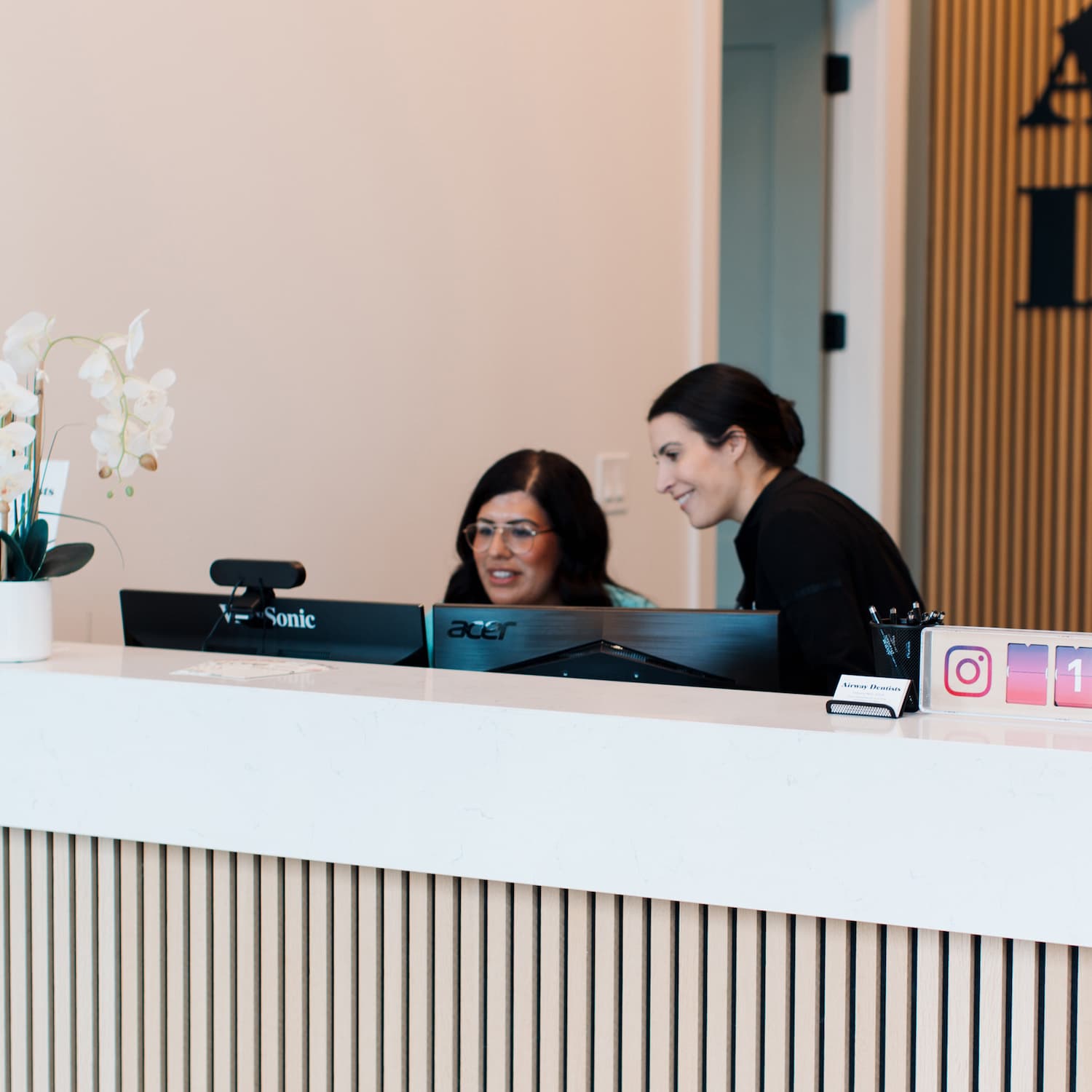 The front desk at The Airway Dentists in Sugar Land, TX, where patients are greeted for check-in