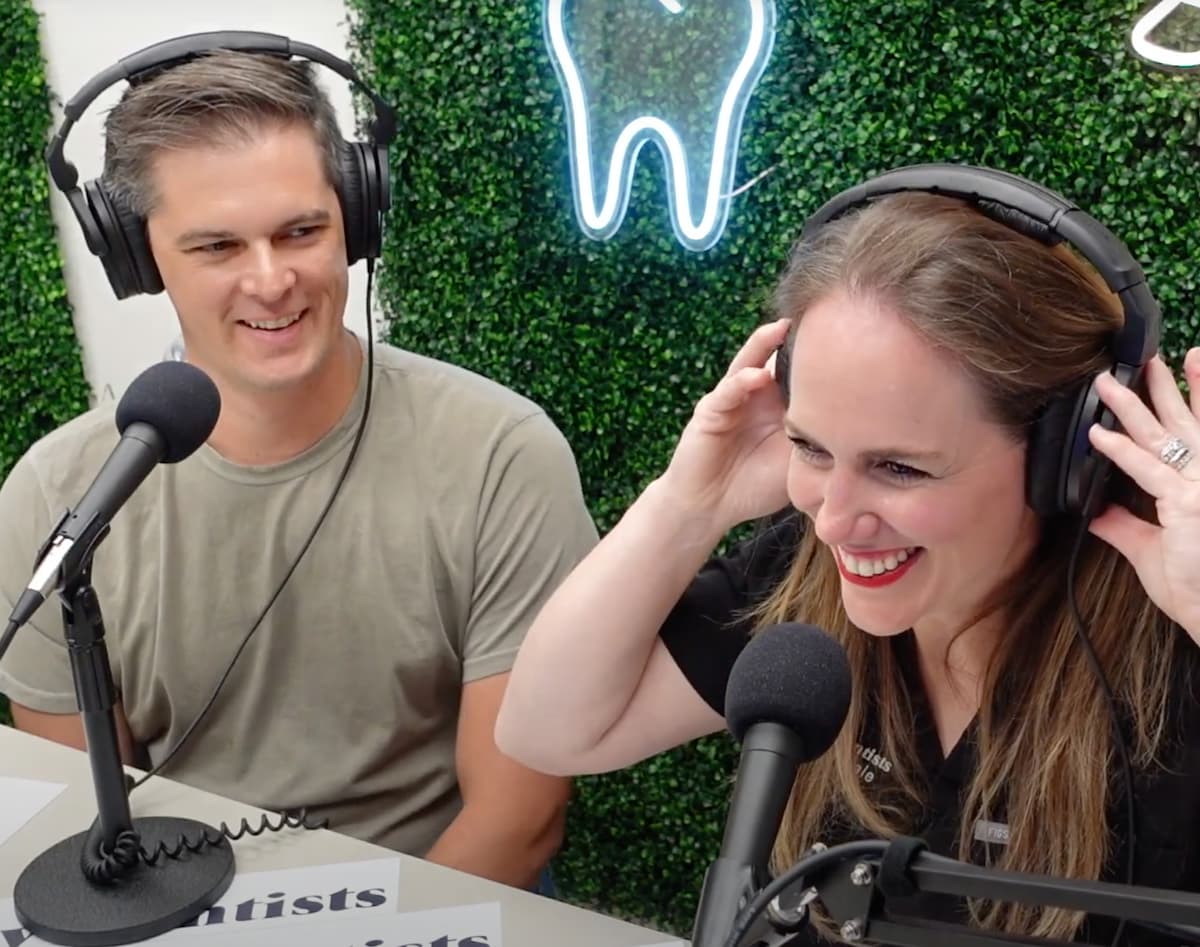 Video still from the Sleep Well Journey Podcast, Dr. Kalli Hale and Dr. Kyle Hale wear headphones while seated at microphones